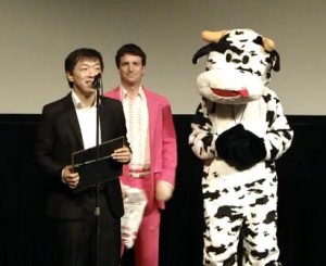 huang bo being presented with award by fellow actor in movie, the Cow!